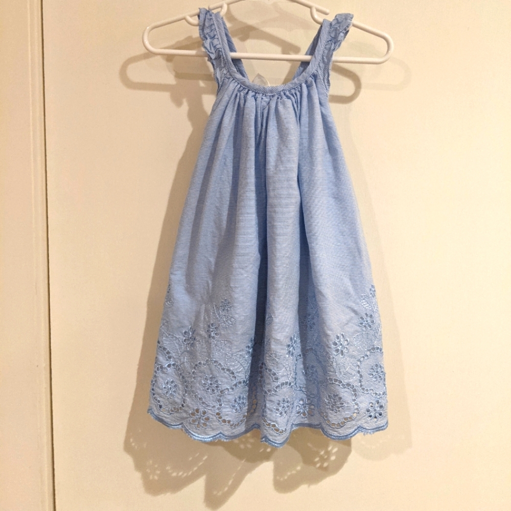 Blue sleeveless dress with bow back